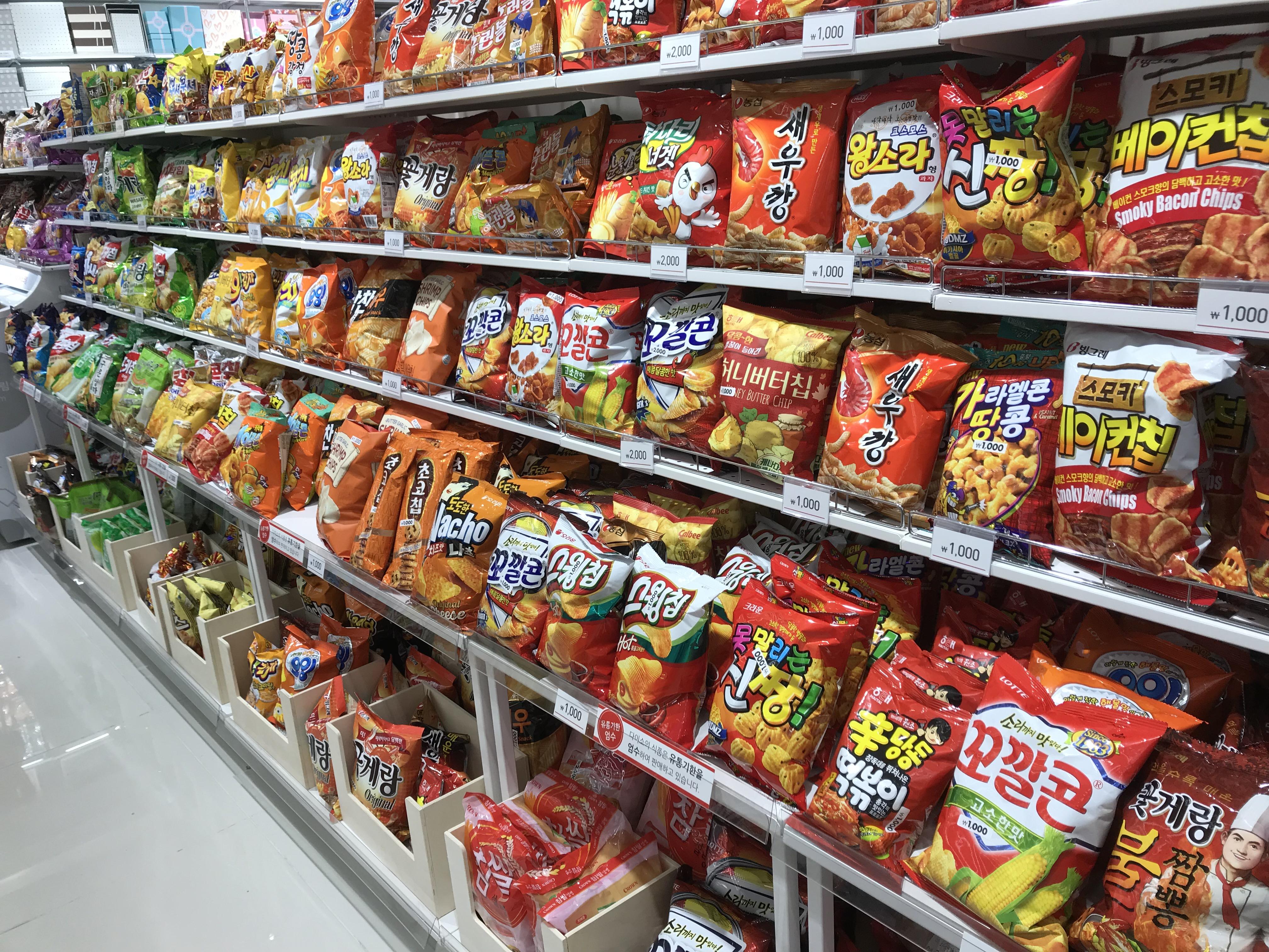 Snack section with chips, candy bars, and packaged goods