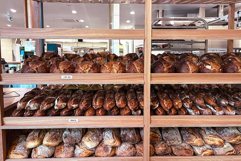 Dairy and bakery section featuring milk, bread, and pastries